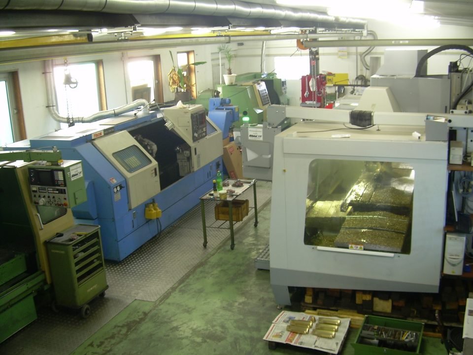 Partial view of our workshops, with the CNC lathes and machining centres